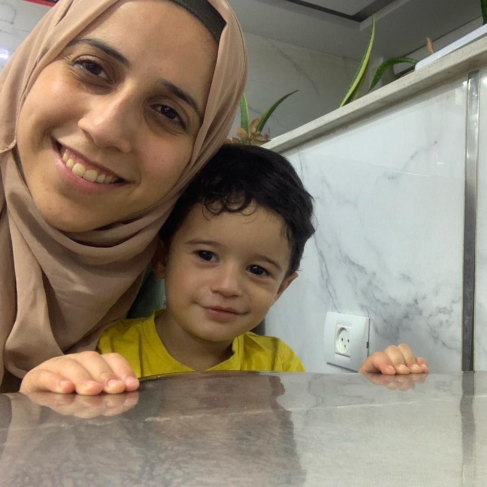 Soad and Omar in their kitchen